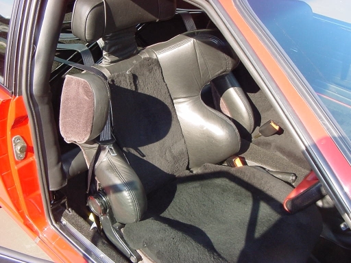 Custom made seat from the original. Reinforced everywhere and use of graded foams in key areas. Covered in kangaroo hide - soft but tougher than Sylvester Stalone