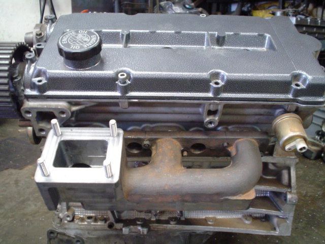 Stainless studs in cast iron manifold..