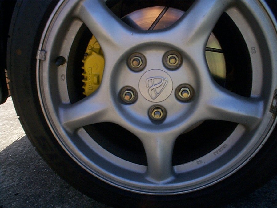 300mm Rotors with 4 spot calipers in 16x8&amp;quot; with 215/45 R16 Azenis tyres