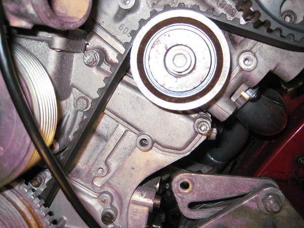 Missing lower right pump mounting bolt