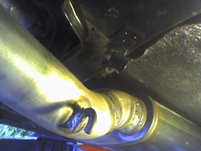 Center Exhaust Hanger broke due to heat.JPG