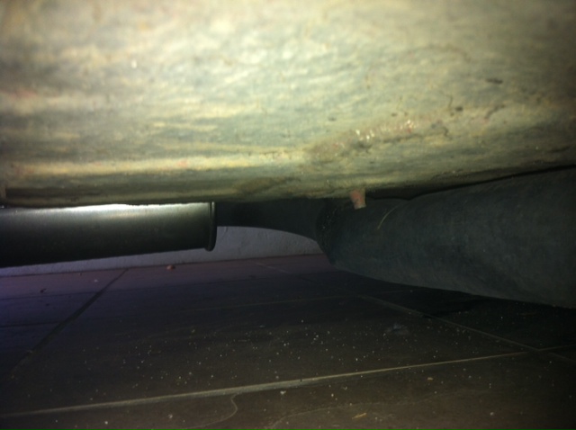 90 degree bend past the silencer box exiting to the left